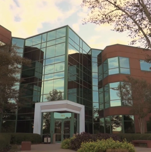 Modern dental office building exterior with glass facade